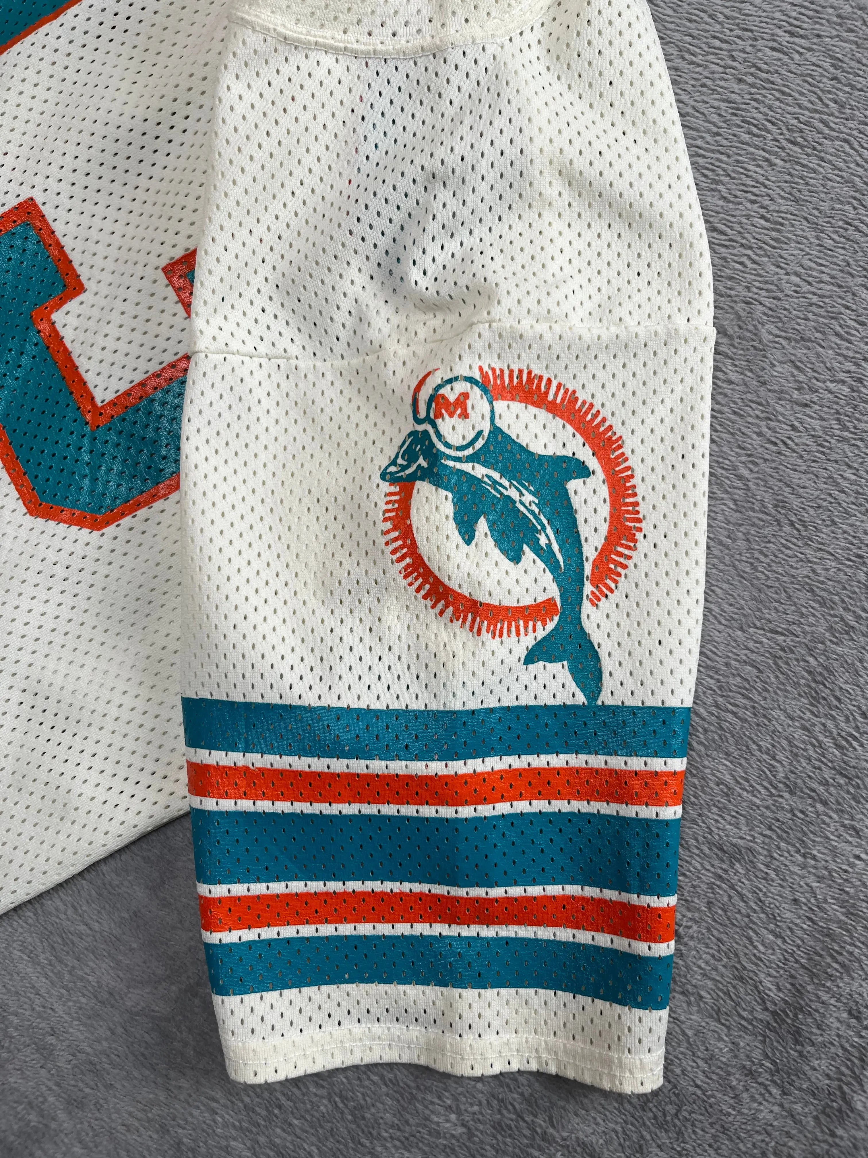 Dan Marino #13 - Miami Dolphins Home 1983-1986 - MacGregor Sand-Knit (M) - Maillot NFL Andwan Shop