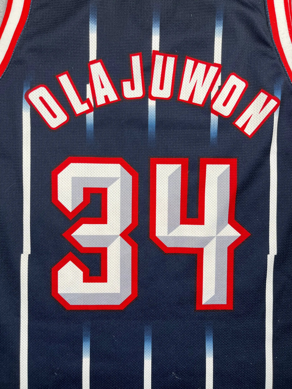 Hakeem Olajuwon #34 - Houston Rockets Away 1996-2001 - Champion (M) - Maillot NBA