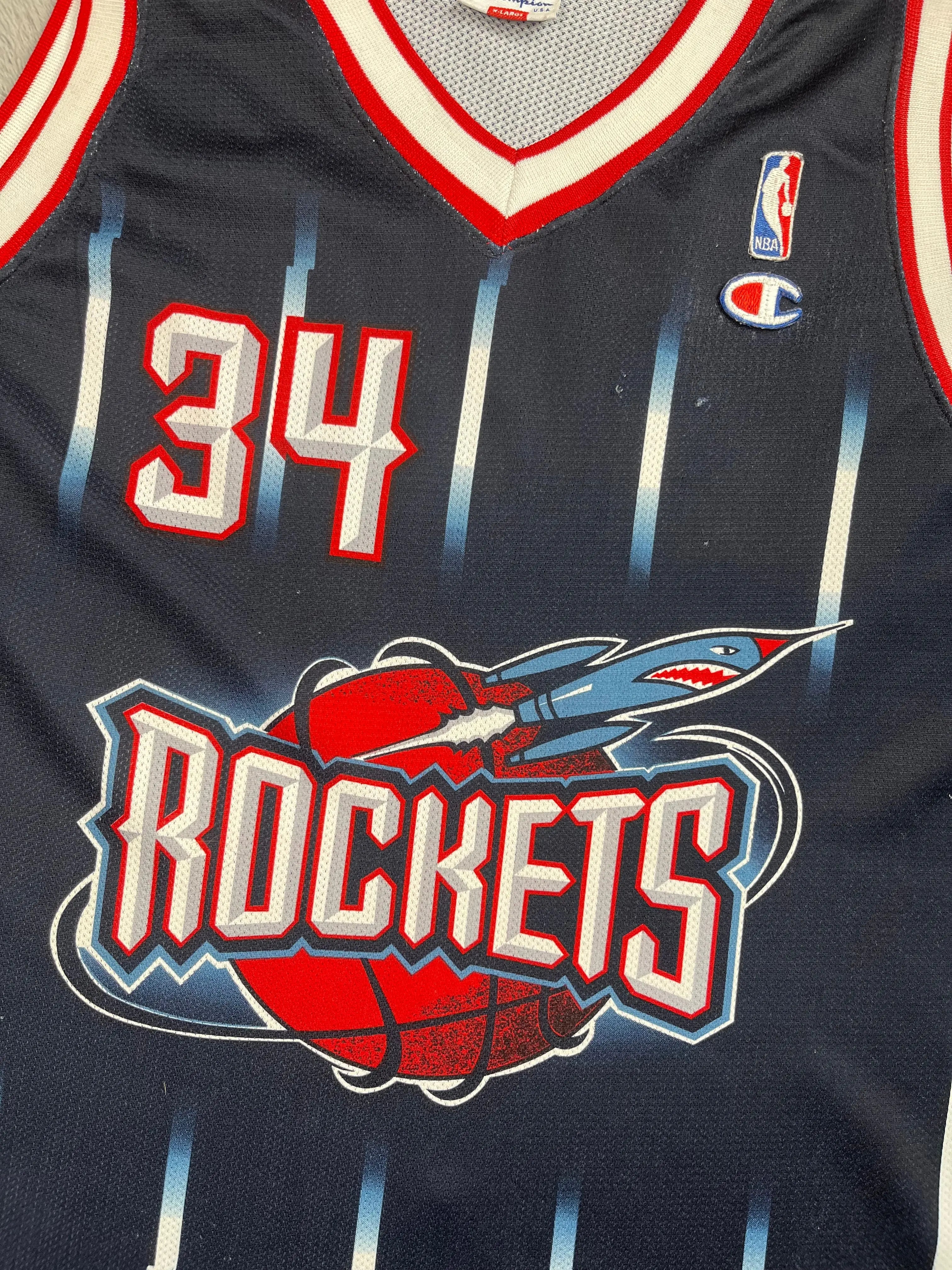 Hakeem Olajuwon #34 - Houston Rockets Away 1996-2001 - Champion (XL) - Maillot NBA Champion