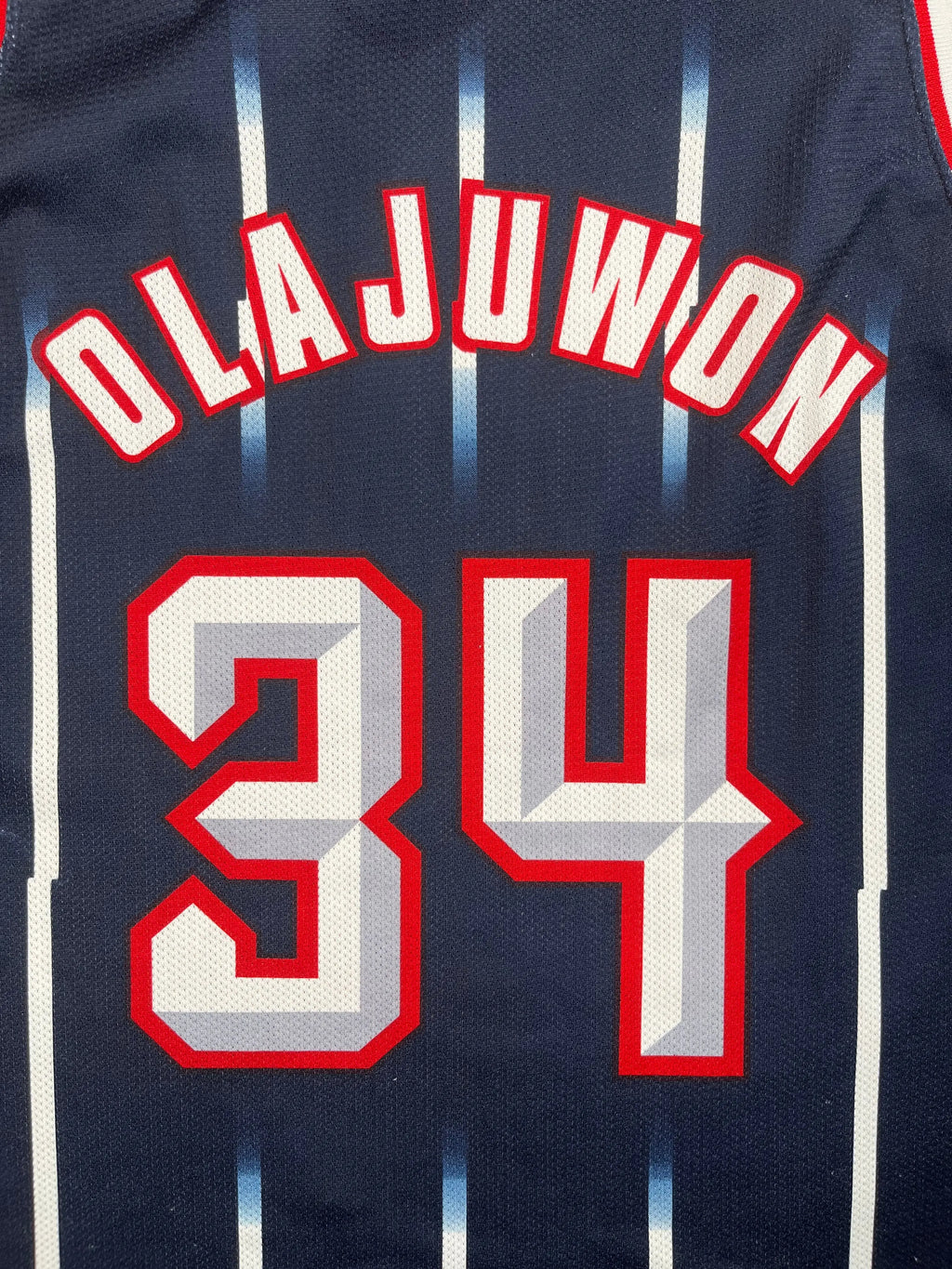 Hakeem Olajuwon #34 - Houston Rockets Away 1996-2001 - Champion (XL) - Maillot NBA Champion