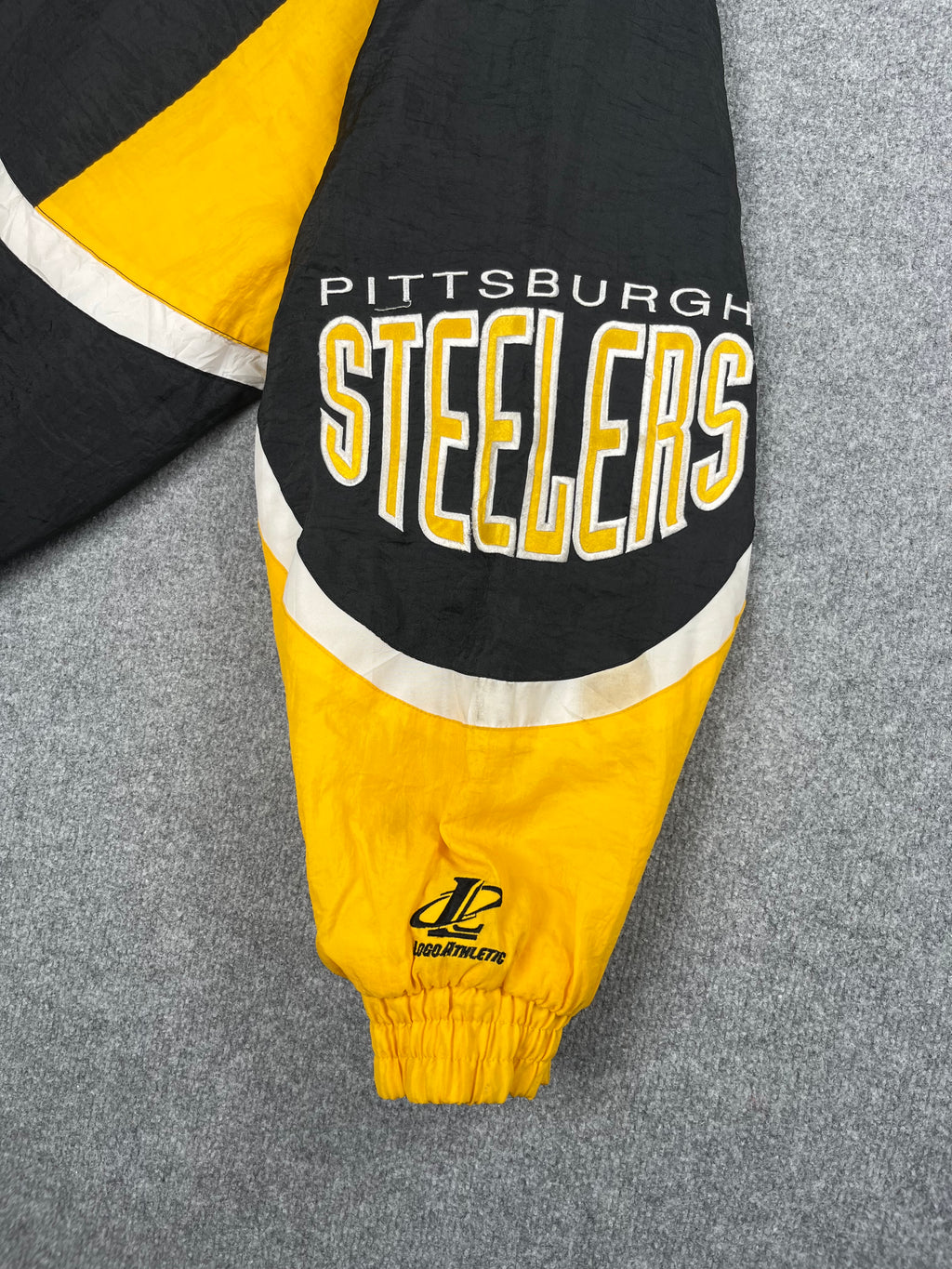 Veste vintage - Doudoune épaisse big logo brodé NFL Pittsburgh Steelers - Logo Athletic (L)